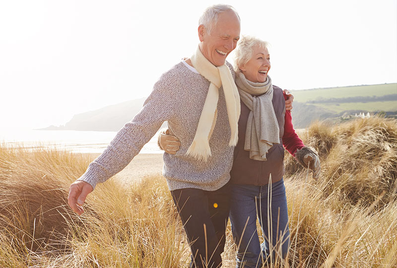 senior couple smiling beautiful dental implant smile